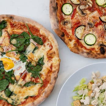 Pizza spread served at Horse & Wig Holborn